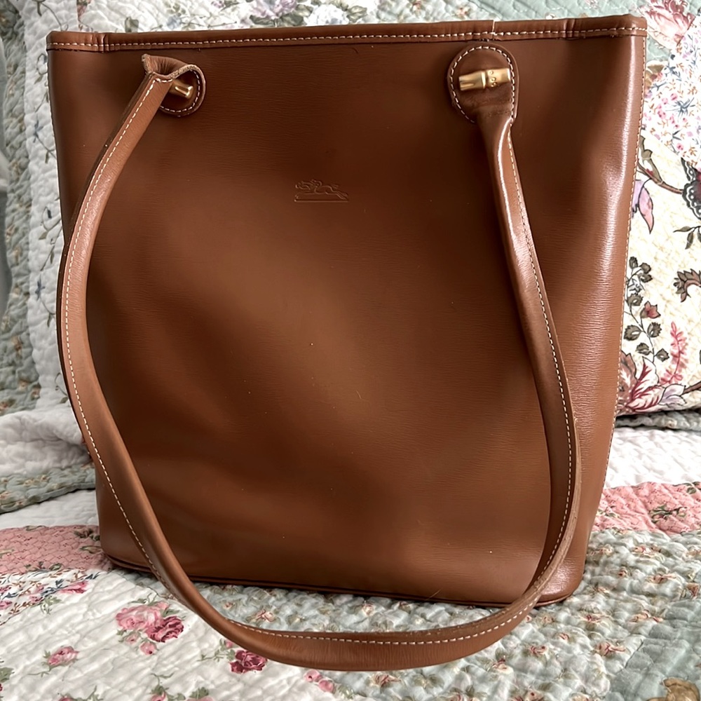 Longchamp tote was used for a month until I decided it was too big.